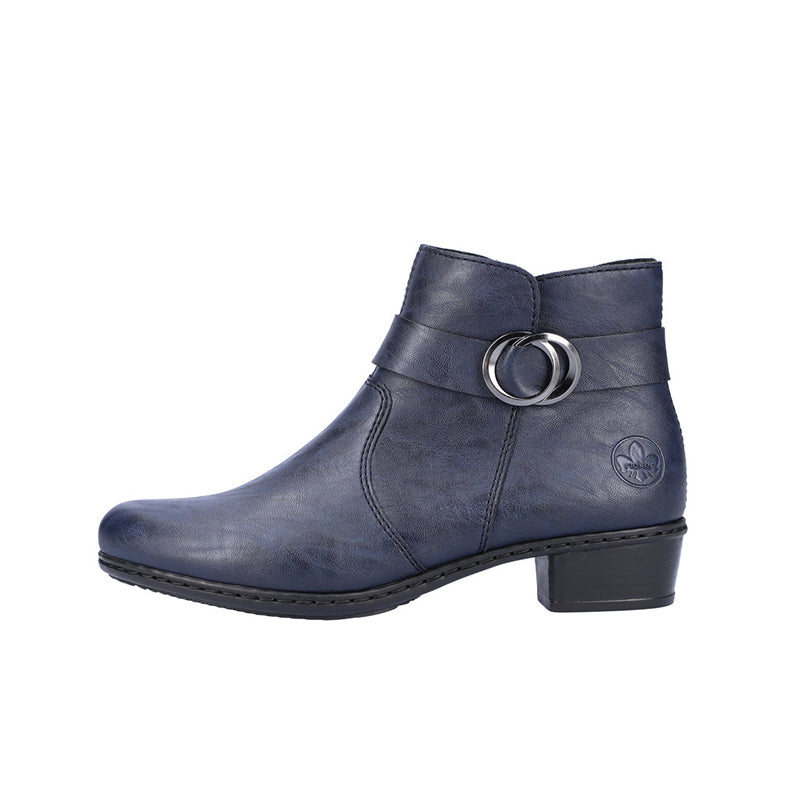 Blue heeled ankle boots with circular buckle detail and side zipper