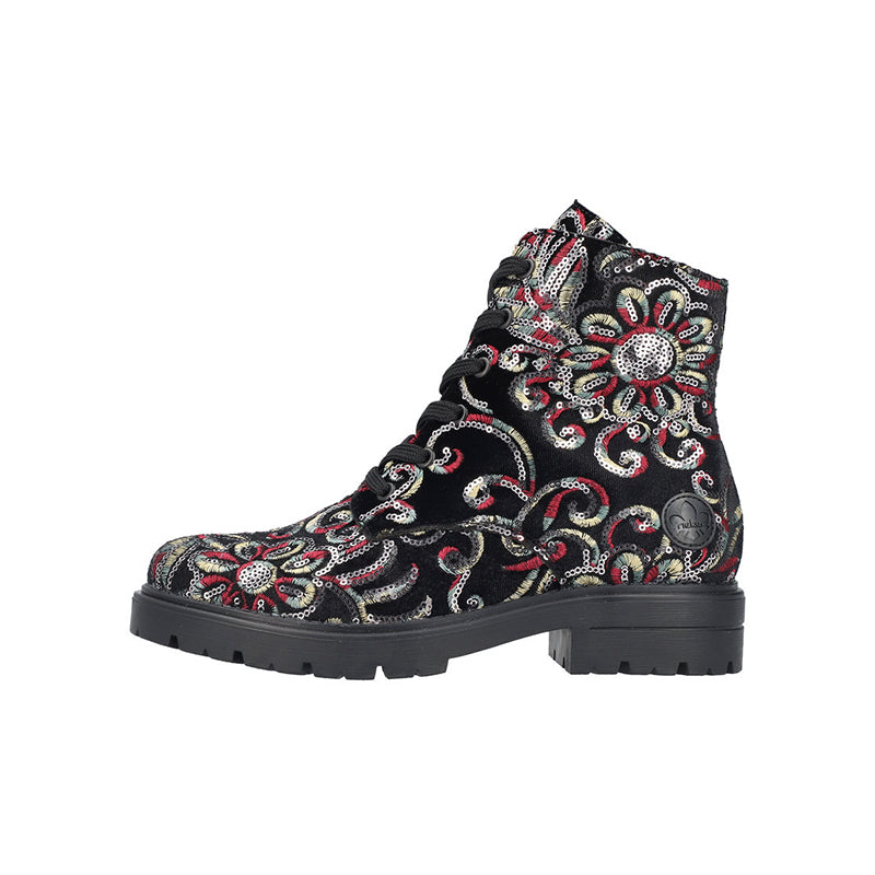 Women’s lace-up ankle boots with black multicolor paisley print and chunky lug sole.