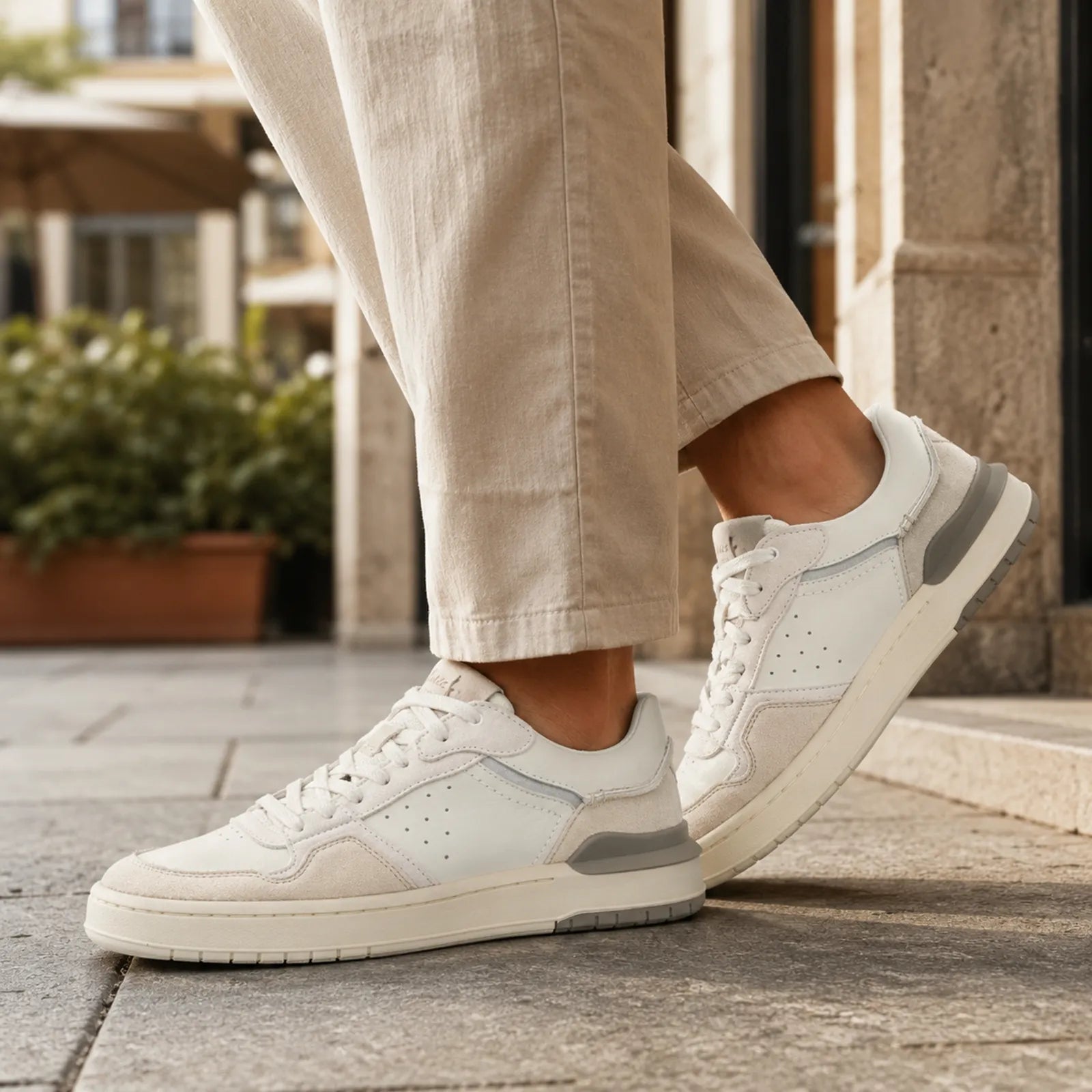 Clarks Courtlite2 Lo off white suede sneakers shown on foot for everyday walking comfort