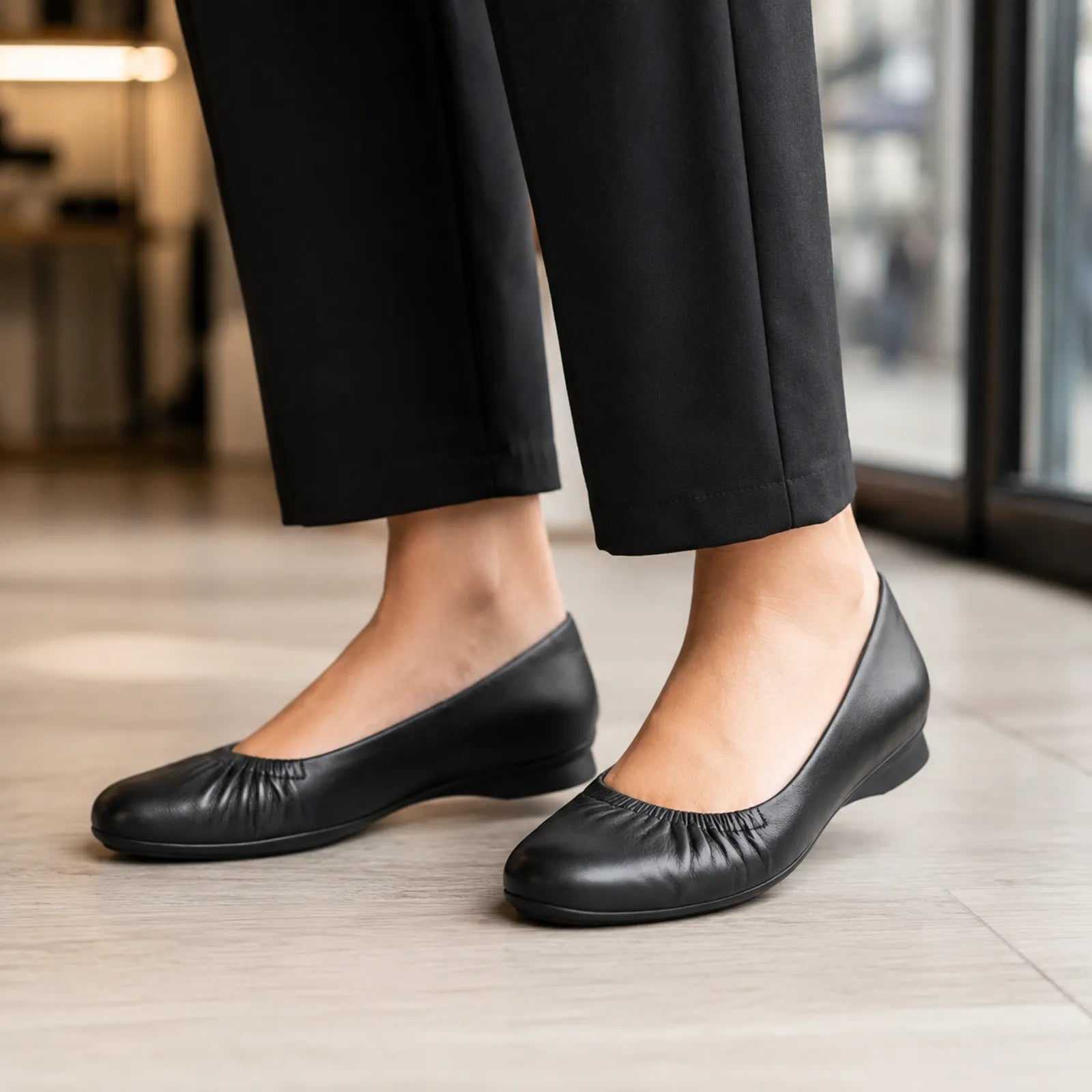 Clarks Jazmynn Lo black leather ballet flats shown on foot for everyday comfort
