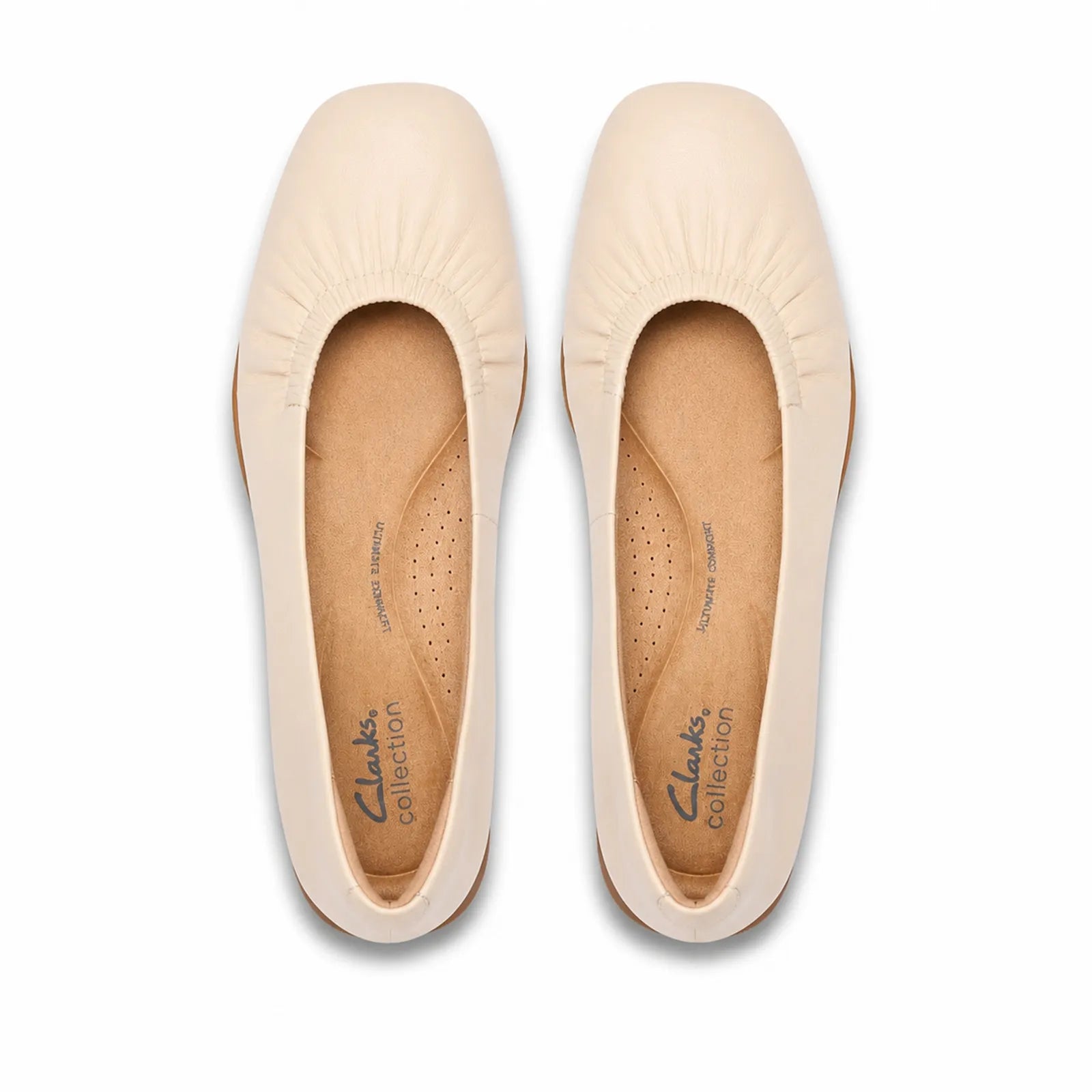 Side view of Clarks Jazmynn Lo women's cream leather ballet flats with flexible TPR sole