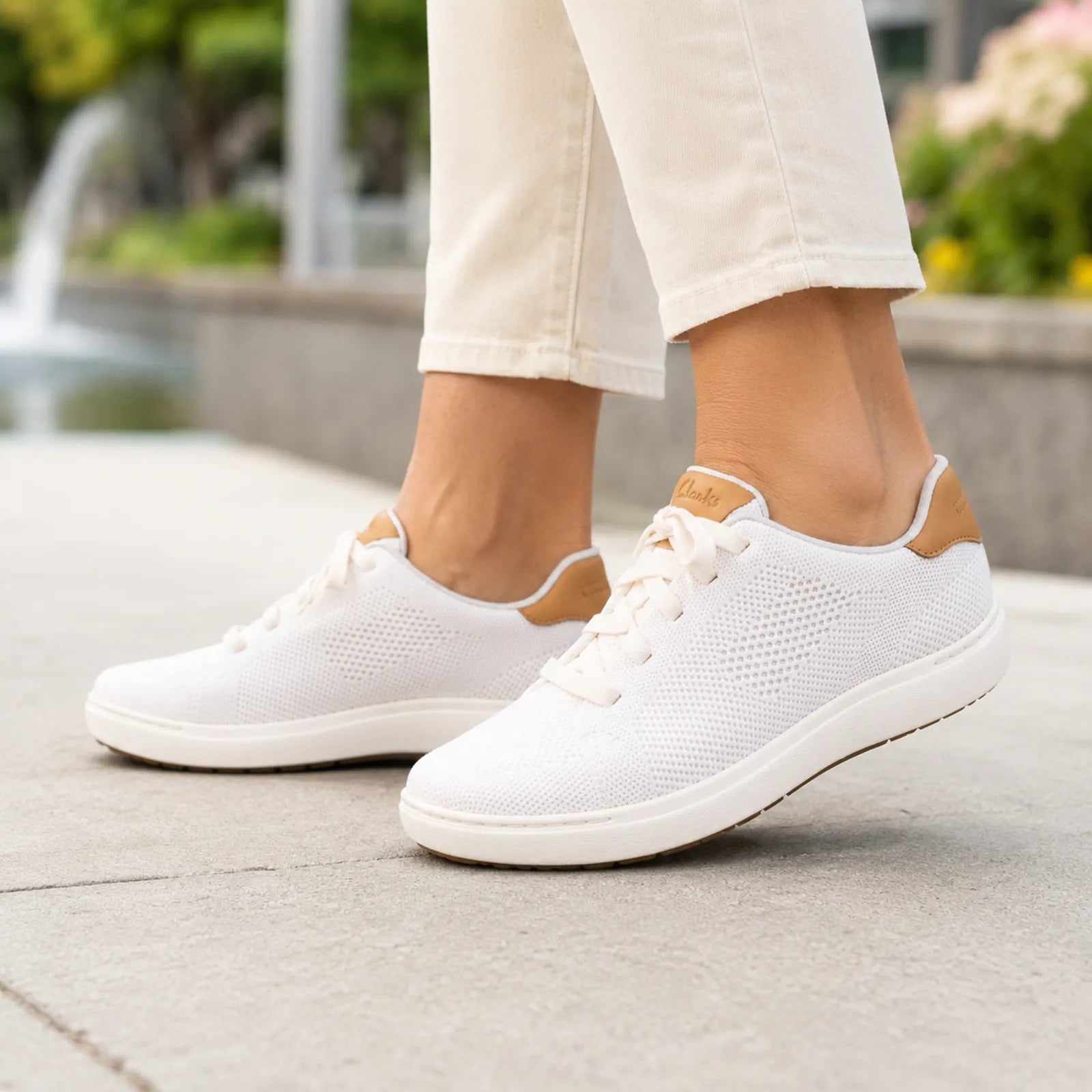 Clarks Nalle Walk white walking sneakers shown on foot for everyday comfort