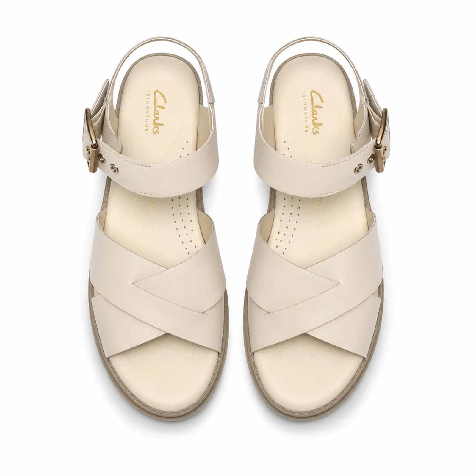 Side view of Clarks Orinoco3 Cross women's cream leather sandals with lightweight EVA sole