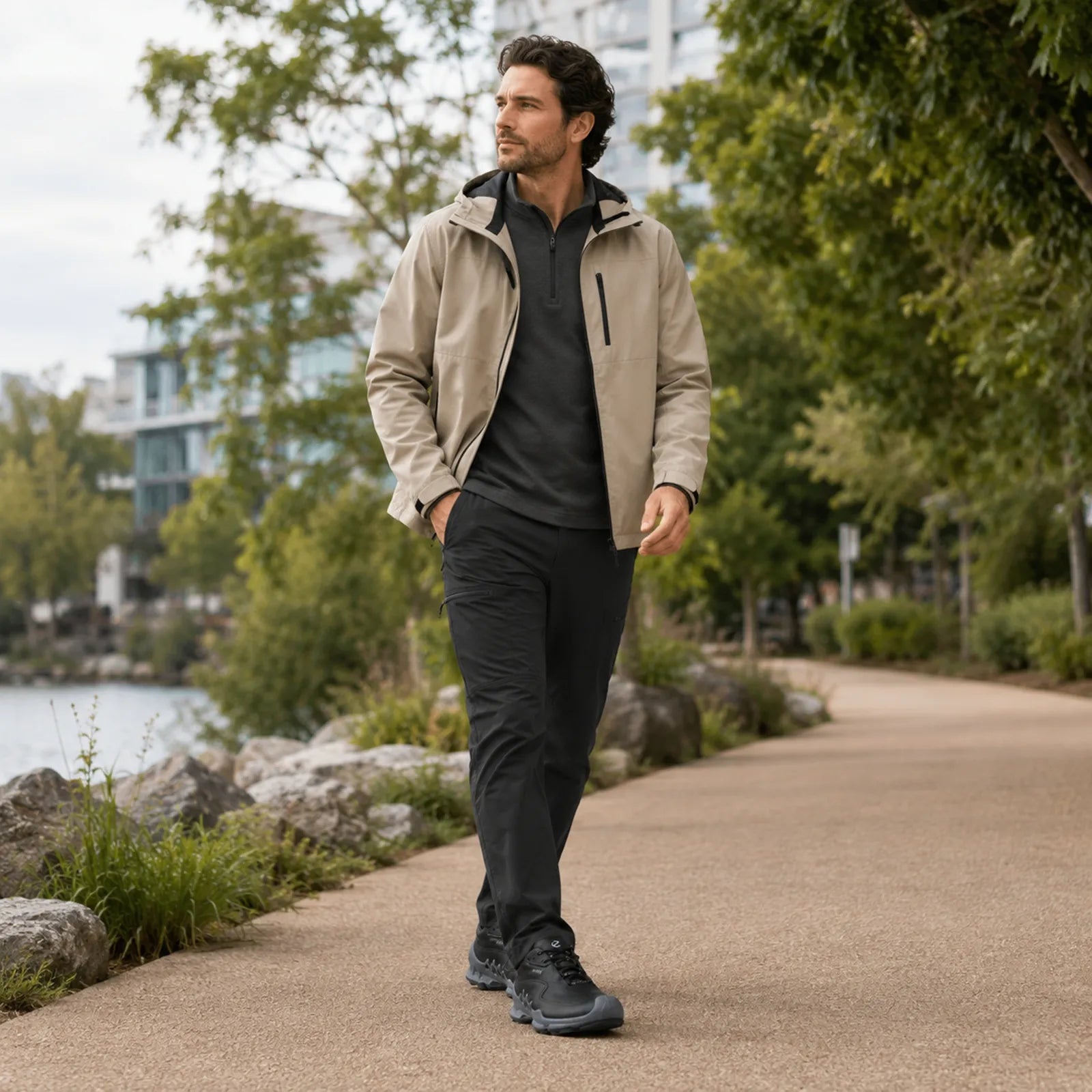 Man wearing ECCO Biom Aex black sneakers for outdoor walking and casual activities